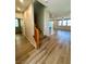 Spacious living room features wood flooring, natural light, and an open floor plan at 9136 Cocowoods Pl, Las Vegas, NV 89148
