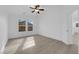 Bright and airy bedroom with new luxury vinyl floors, ceiling fan and neutral paint scheme at 9315 Indian Corn Ct # 101, Las Vegas, NV 89178