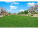 Lush green common area with picnic benches and mature landscaping at 9315 Indian Corn Ct # 101, Las Vegas, NV 89178