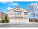 Inviting townhouse featuring a neutral color scheme, attached garages and well maintained landscaping at 9315 Indian Corn Ct # 101, Las Vegas, NV 89178