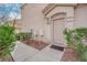 Inviting front entrance with a well maintained walkway and desert landscaping at 9315 Indian Corn Ct # 101, Las Vegas, NV 89178
