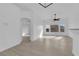 Bright living room with light wood-look floors connects multiple living spaces at 9315 Indian Corn Ct # 101, Las Vegas, NV 89178