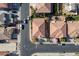 An aerial view of a residential neighborhood with well-maintained homes and mature landscaping at 948 Mill Run Creek Ave, Henderson, NV 89002