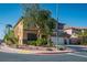 Charming two-story home featuring a well-manicured front yard with mature trees and a welcoming two-car garage at 948 Mill Run Creek Ave, Henderson, NV 89002