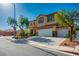 Inviting two-story home featuring a three-car garage and tasteful landscaping at 948 Mill Run Creek Ave, Henderson, NV 89002