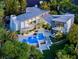 Striking aerial view of a luxury home with a private pool, patio, and lush landscaping at 1108 Pine Island Ct, Las Vegas, NV 89134