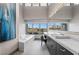Modern bathroom with soaking tub, large vanity, mountain views, and stylish fixtures at 1108 Pine Island Ct, Las Vegas, NV 89134