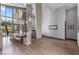 Bright and airy living space with high ceilings, elegant decor, and seamless outdoor access at 1108 Pine Island Ct, Las Vegas, NV 89134