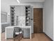 Stylish home office featuring custom built-ins for ample storage at 1108 Pine Island Ct, Las Vegas, NV 89134