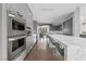 Spacious kitchen with modern appliances and a stylish breakfast bar at 1108 Pine Island Ct, Las Vegas, NV 89134