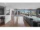 Open living room featuring floor to ceiling windows at 1108 Pine Island Ct, Las Vegas, NV 89134