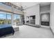 Spacious main bedroom with large windows, high ceilings, fireplace, and luxurious furnishings at 1108 Pine Island Ct, Las Vegas, NV 89134