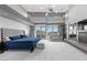 Spacious main bedroom with large windows, high ceilings, fireplace, and luxurious furnishings at 1108 Pine Island Ct, Las Vegas, NV 89134