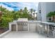 State-of-the-art outdoor kitchen featuring stainless steel appliances and ample counter space for entertaining at 1108 Pine Island Ct, Las Vegas, NV 89134