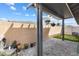 Paver patio with a putting green and covered area provides a relaxing area to entertain at 1174 King Lark St, Henderson, NV 89011