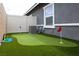 The artificial grass putting green in backyard makes for easy outdoor fun at 1174 King Lark St, Henderson, NV 89011
