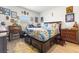 Comfortable bedroom with wood floors and stylish furniture at 1174 King Lark St, Henderson, NV 89011