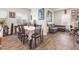 Bright dining room with wood floors and neutral decor at 1174 King Lark St, Henderson, NV 89011