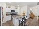 Contemporary kitchen with a center island, stainless steel appliances, and open layout at 1174 King Lark St, Henderson, NV 89011