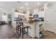 Modern kitchen featuring stainless steel appliances, center island, and ample cabinet space at 1174 King Lark St, Henderson, NV 89011