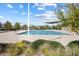 Community pool with plenty of seating provides a relaxing place to lounge and enjoy the sunshine at 1174 King Lark St, Henderson, NV 89011