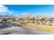 Overhead view of a residential neighborhood featuring well-maintained streets, desert landscaping, and mountain views at 12169 Castilla Rain Ave, Las Vegas, NV 89138