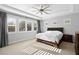 Bedroom featuring a ceiling fan, recessed lighting, three windows, and light filtering window coverings at 12169 Castilla Rain Ave, Las Vegas, NV 89138