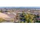 This aerial view showcases the neighborhood with a skyline backdrop of the city at 12169 Castilla Rain Ave, Las Vegas, NV 89138