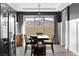 Dining room featuring modern lighting, a barrel accent and a backyard view at 12169 Castilla Rain Ave, Las Vegas, NV 89138