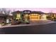Charming single-story home featuring a three-car garage, meticulously landscaped front yard, and inviting entrance at 12169 Castilla Rain Ave, Las Vegas, NV 89138