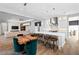 Bright, open kitchen featuring a large island, modern appliances, and adjacent dining area, ideal for entertaining at 12169 Castilla Rain Ave, Las Vegas, NV 89138