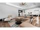 Spacious living room flowing into the kitchen and dining area at 12169 Castilla Rain Ave, Las Vegas, NV 89138