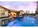 Backyard pool and spa with inviting patio furniture for outdoor living at 12169 Castilla Rain Ave, Las Vegas, NV 89138
