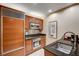 This gourmet kitchen is complete with stainless steel appliances, custom cabinetry, and sleek countertops at 145 E Harmon Ave # 201, Las Vegas, NV 89109