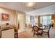 Inviting living room with comfortable seating, a dining area, and scenic city views at 145 E Harmon Ave # 201, Las Vegas, NV 89109
