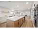 Bright kitchen with an island, stainless steel appliances, and an open concept design at 1917 N Moapa Valley Blvd, Logandale, NV 89021