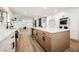 Gourmet kitchen with an island, stainless steel appliances, and views into the living area at 1917 N Moapa Valley Blvd, Logandale, NV 89021
