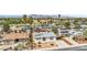 A sunny aerial view of a single-story home with desert landscaping and neighborhood surroundings at 2021 N Michael Way, Las Vegas, NV 89108