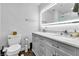 Modern bathroom featuring a double vanity, sleek lighting, and contemporary fixtures, offering a luxurious feel at 2021 N Michael Way, Las Vegas, NV 89108