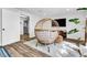 Bedroom featuring wood floors and a wicker chair at 2021 N Michael Way, Las Vegas, NV 89108