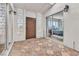 Bright entryway with tile flooring and views to the bedroom with natural light at 2021 N Michael Way, Las Vegas, NV 89108
