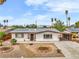 Charming single-story home with well-maintained desert landscaping and a welcoming entrance at 2021 N Michael Way, Las Vegas, NV 89108