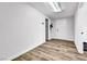 Spacious hallway with wood floors leading to a room at 2021 N Michael Way, Las Vegas, NV 89108