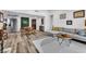 Modern living room with stylish decor, a cozy couch, and a dining area, perfect for relaxing and entertaining at 2021 N Michael Way, Las Vegas, NV 89108