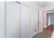 Bedroom featuring closet, neutral colors, and wood laminate floors at 2117 Mountain Sunset Ave, North Las Vegas, NV 89031