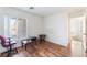 Bedroom featuring laminate floors and a comfortable chair at 2117 Mountain Sunset Ave, North Las Vegas, NV 89031