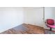 Bedroom featuring closet, neutral colors, and wood laminate floors at 2117 Mountain Sunset Ave, North Las Vegas, NV 89031
