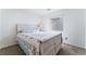 Bright bedroom features neutral colors and a comfortable bed at 2117 Mountain Sunset Ave, North Las Vegas, NV 89031