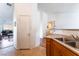 Open kitchen featuring laminate countertops and stainless steel sink at 2117 Mountain Sunset Ave, North Las Vegas, NV 89031