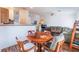 Open floor plan, dining area, and living room with wood laminate flooring at 2117 Mountain Sunset Ave, North Las Vegas, NV 89031